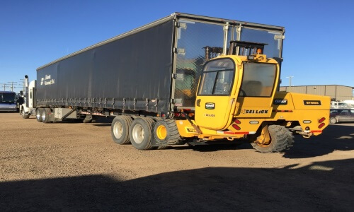 Curtain Side Flatbed with Forklift for Self Loading/Unloading